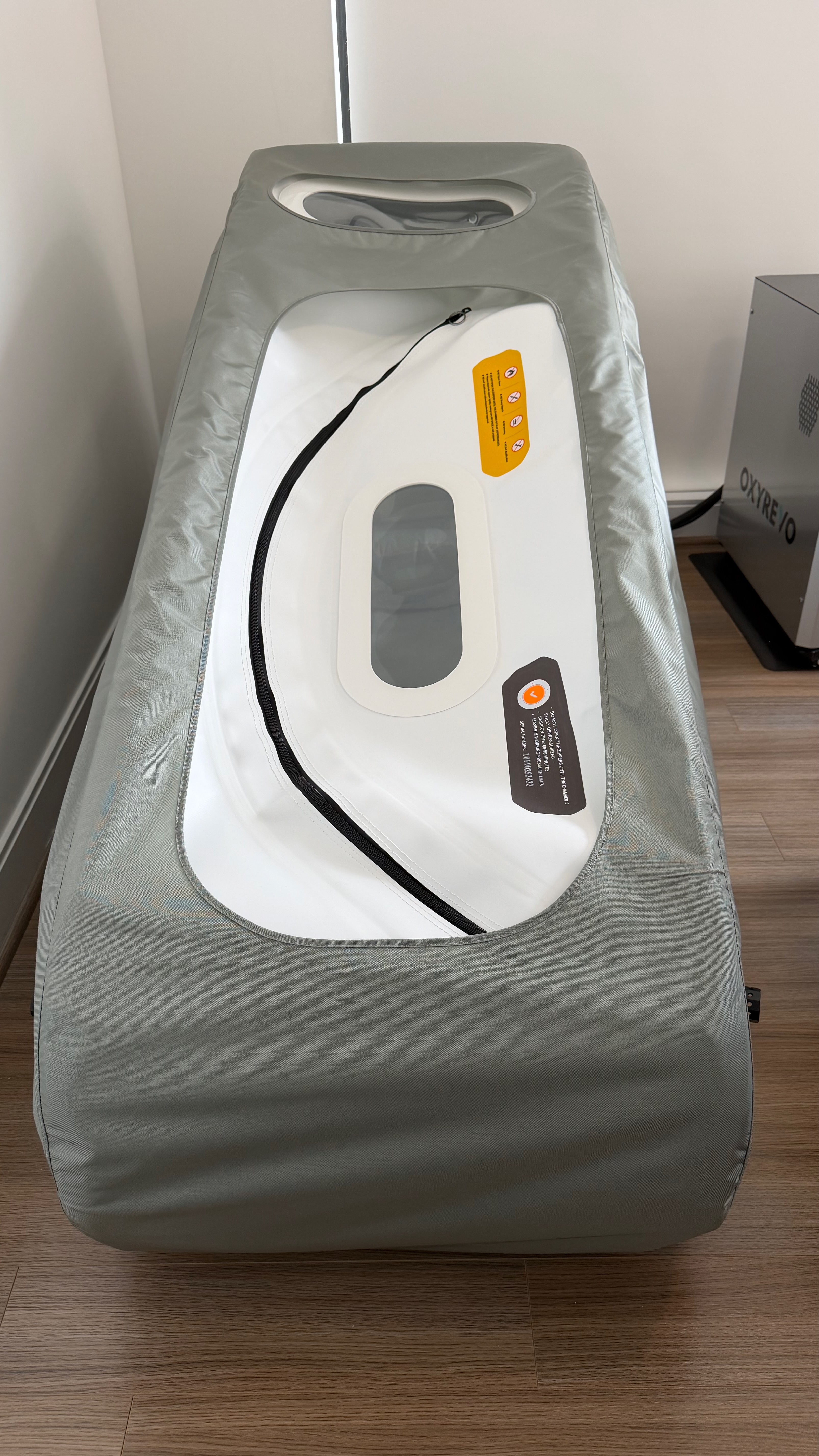 Used hyperbaric chamber Atlanta — OXYREVO Forward90 Pro shown fully zipped closed in like-new exterior condition (only 40 personal-use sessions). Actual unit photo from the seller's Buckhead, Atlanta GA home, available for local pickup.